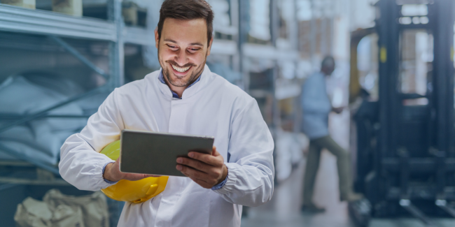 Operator holding iPad EZ Factory